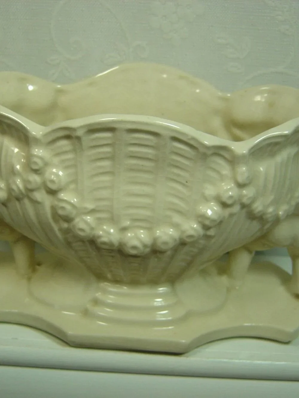 Vintage white planter/vase--cherubs beside a vase-5 1/4